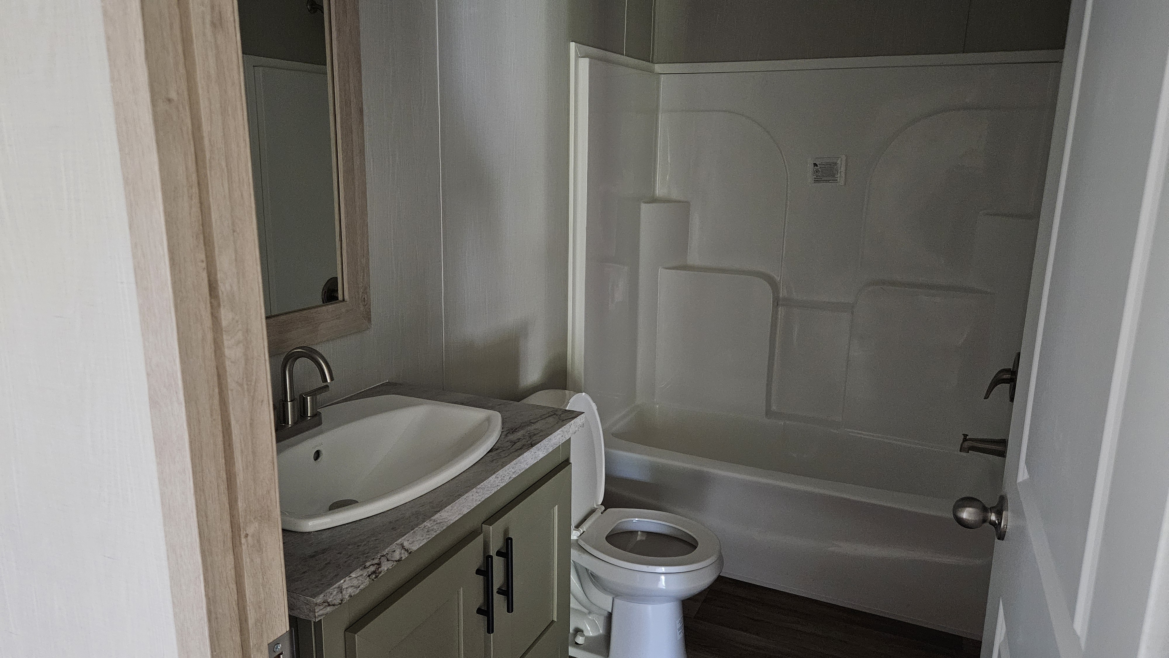 Guest bathroom vanity and tub